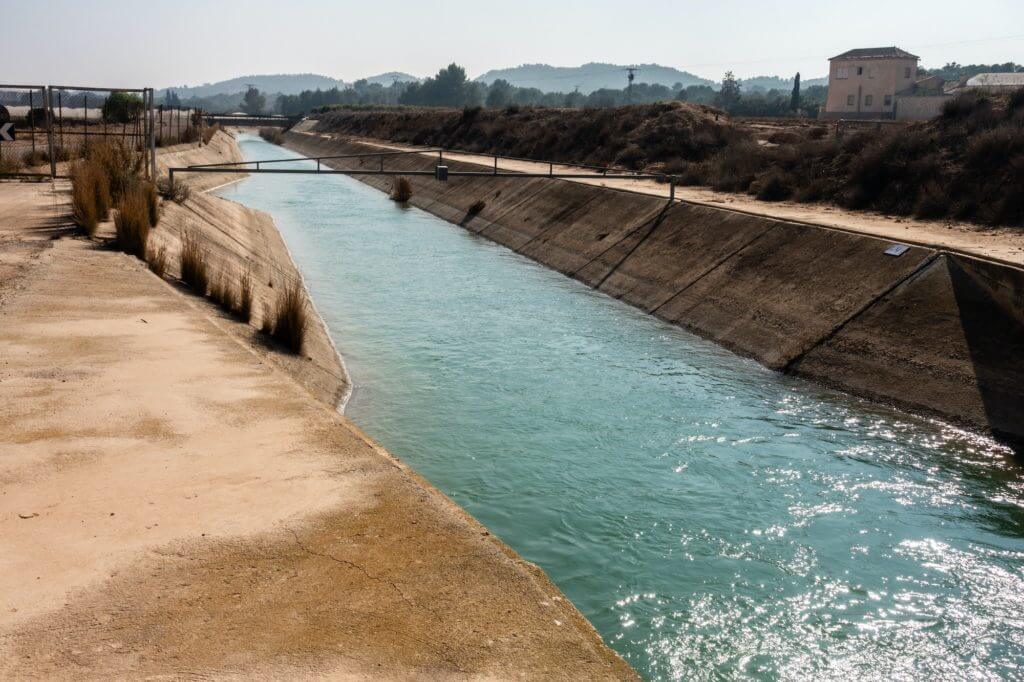 Fast-flowing water of aqueduct in Valenciana,Spain